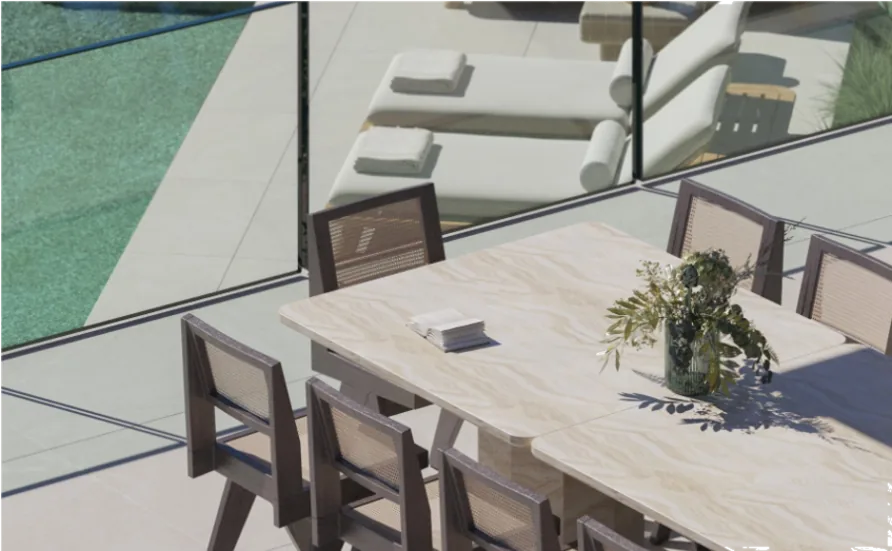 Outdoor dining terrace with views over the bay