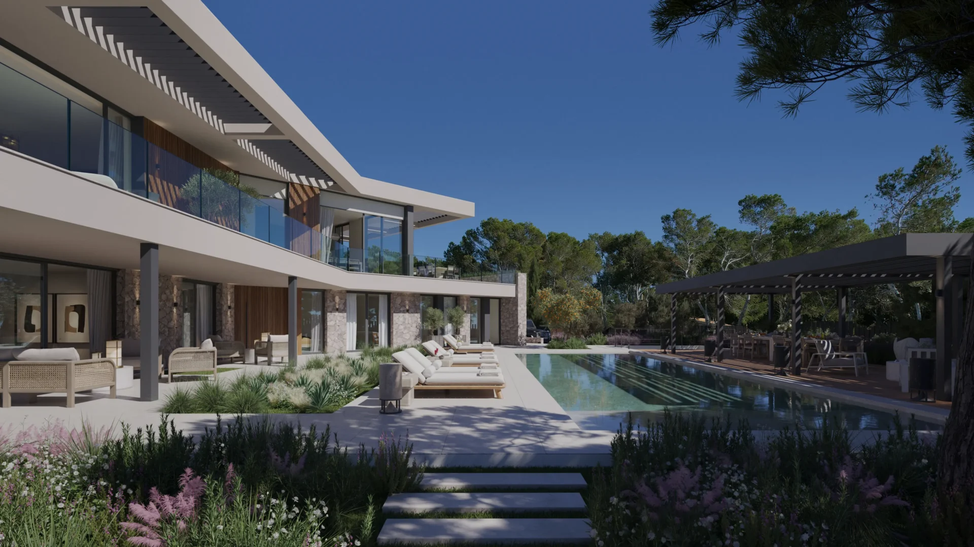 Casa Maravilla at dusk, with the illuminated pool and terraces